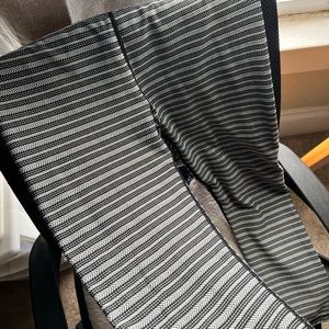 Black Aztec Adrenaline 7/8 24" Leggings.  EUC and a thicker knit fabric.